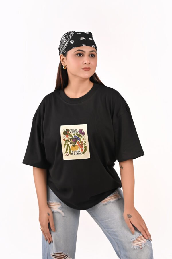 DSC_5875 copy Women’s Oversized Graphic T-Shirt – Black “Garden of Change” Print